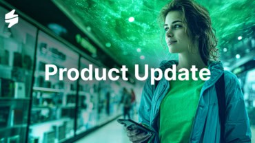 Modern woman using smartphone in tech store with digital overlay, representing product update of Staffino's customer service solutions.